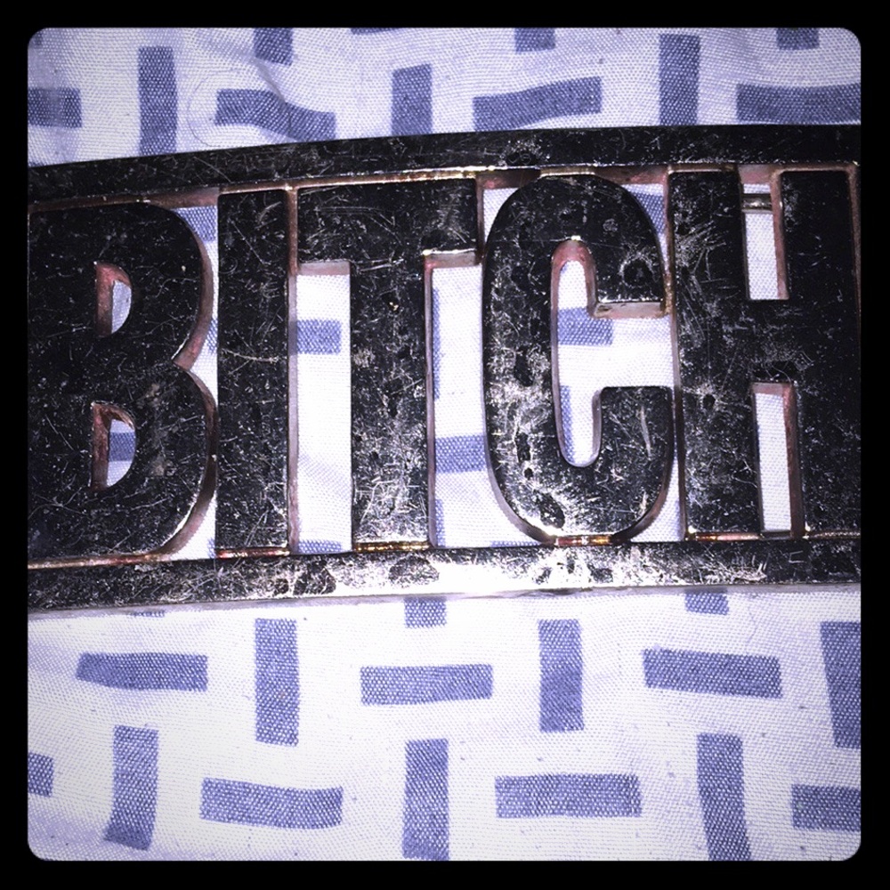BITCHbelt buckle a few years old a couple  scratch